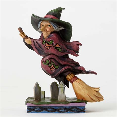 Flying witch on a broomstick figurine